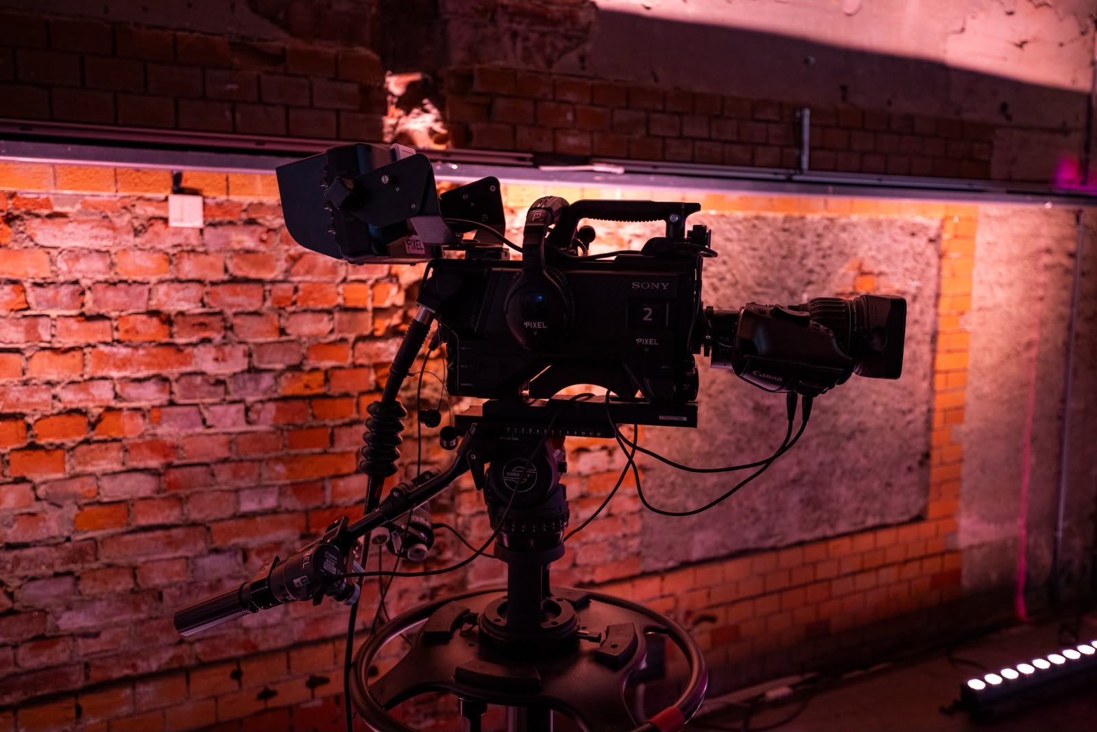 Broadcast camera in the studio light