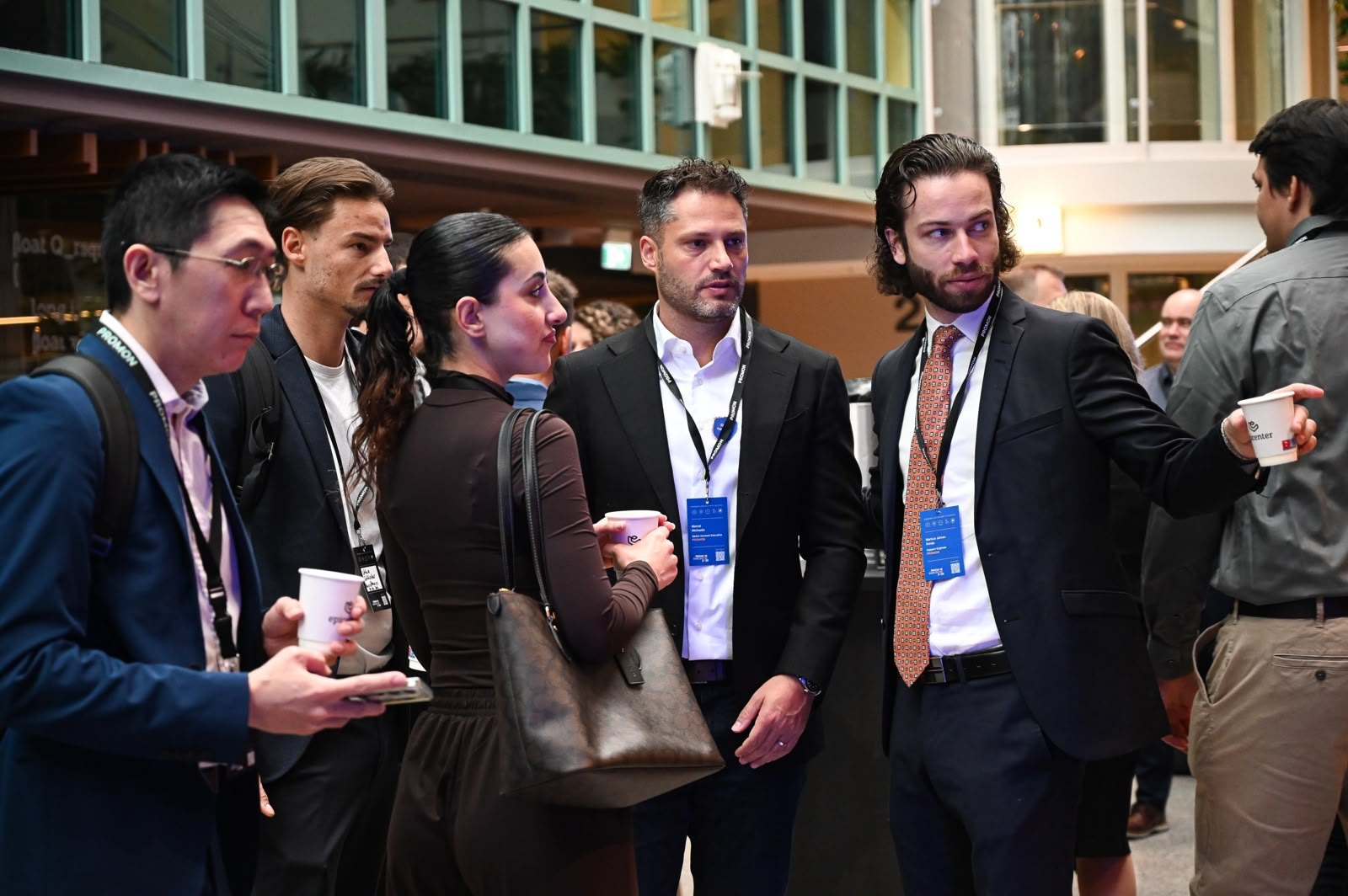 Attendees catching up between sessions